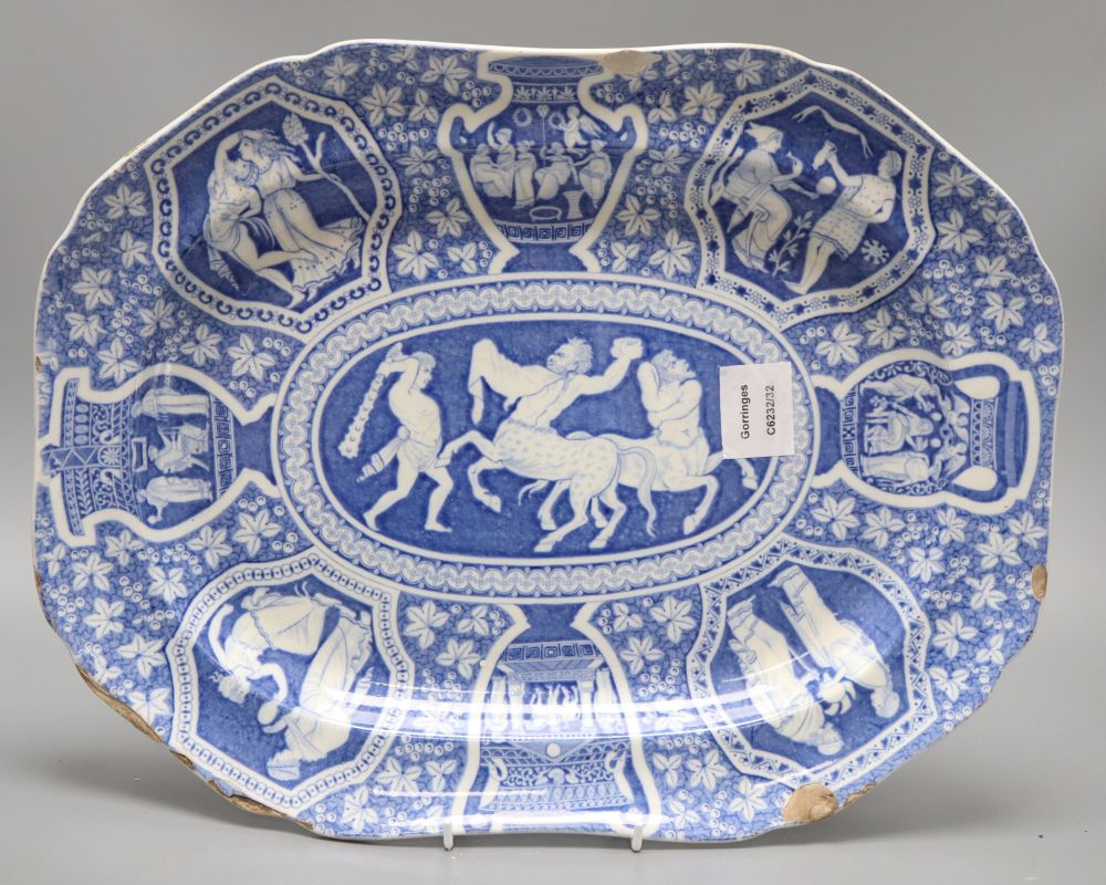 A Victorian blue and white meat plate, depicting scenes from Greek mythology, length 41cm